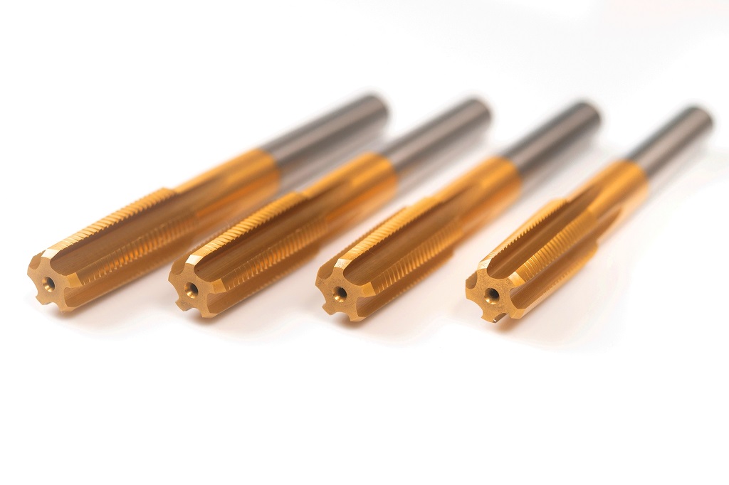 The screw tap is primarily used to cut internal threads on screw blanks, ensuring precise thread dimensions and a smooth surface finish.